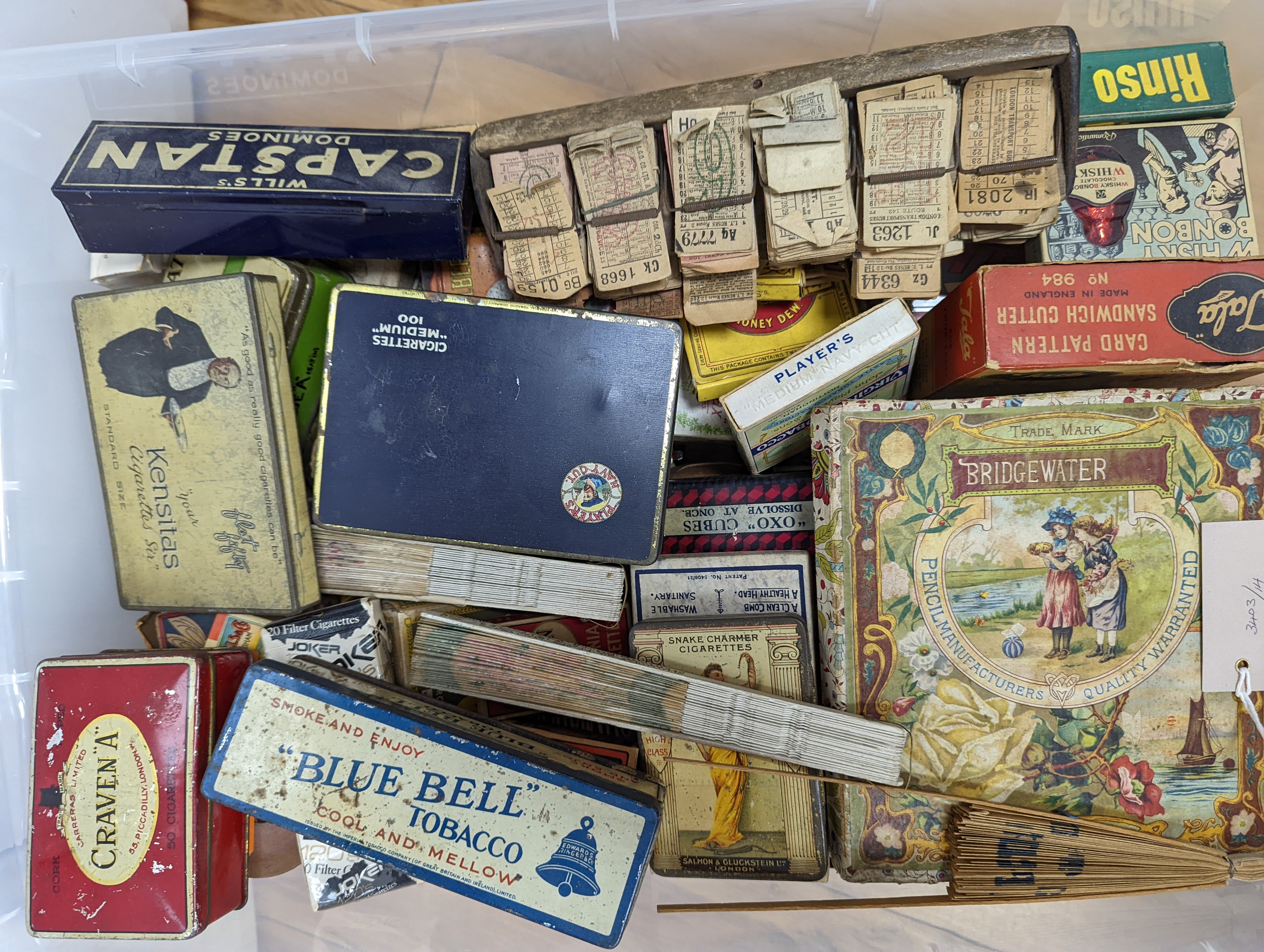 A large collection of advertising boxes, tins etc